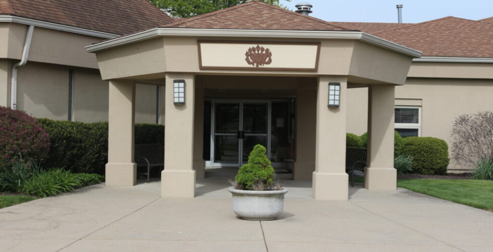 Photograph of the front entrance to the building.