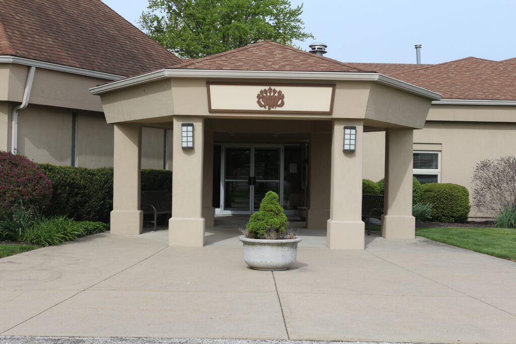 Photograph of the front entrance to the building.